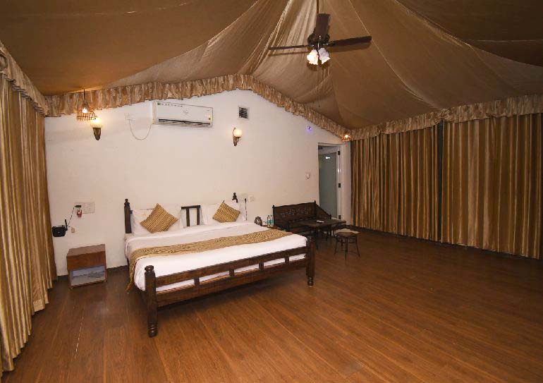 Svasara Jungle Lodge eco-cottage surrounded by forest at Tadoba