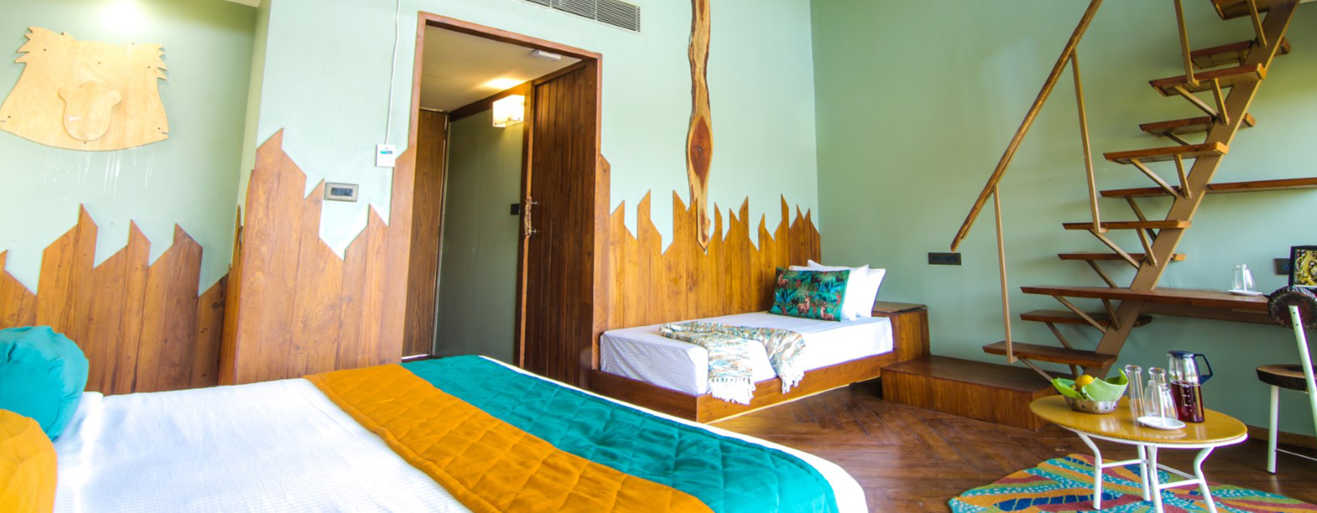 Svasara lodge exterior at golden hour Tadoba