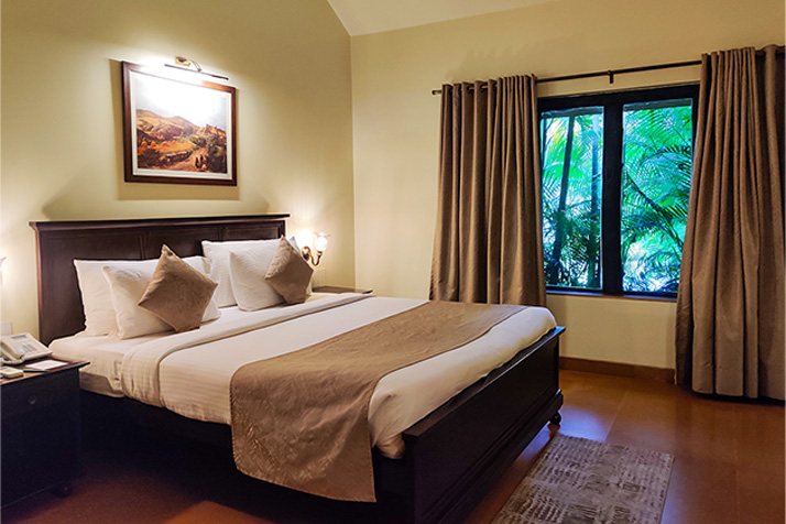 Welcom Heritage Resort Tadoba — traditional architecture with lush gardens